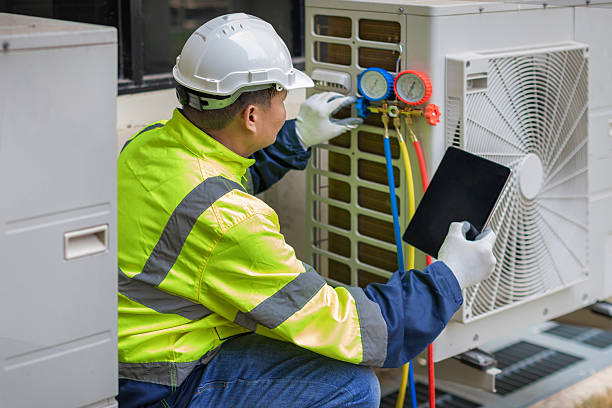 Professional Hvac technician working in Eastport, NY